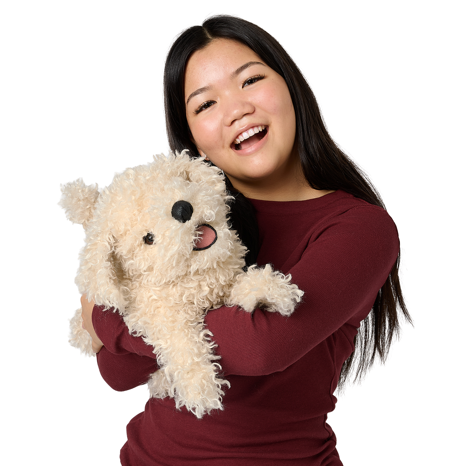 Folkmanis white poodle puppy hand puppet with curly cream-coloured fur, held by a laughing teenage girl