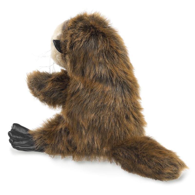 Folkmanis Handpuppe Seeotter-Baby in Seitenansicht, braunes zottiges Fell, schwarze Leder-Hinterpfoten und buschiger Schwanz.