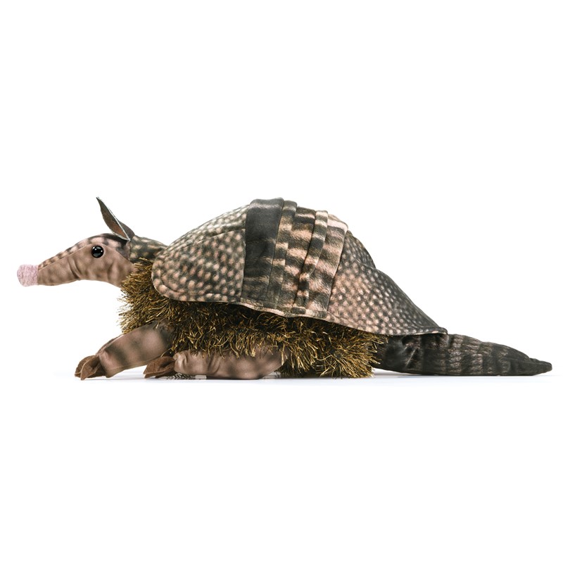 Folkmanis armadillo hand puppet shown from the side with a detailed brown and beige armoured shell and gold-coloured plush trim on the belly