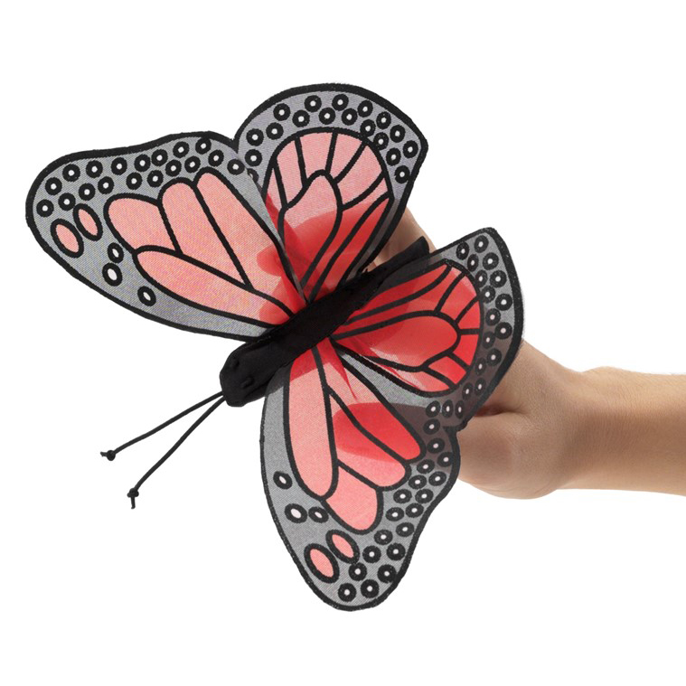 Folkmanis Fingerpuppe mini Monarchschmetterling mit rot-schwarzen Flügeln auf ausgestrecktem Finger, Seitenansicht