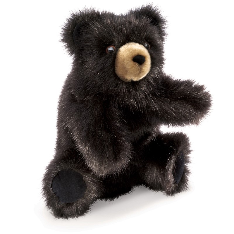 Folkmanis Handpuppe kleiner Schwarzbär mit schwarzem Plüschfell und beigem Schnauzenbereich, sitzend mit ausgestreckter Pfote