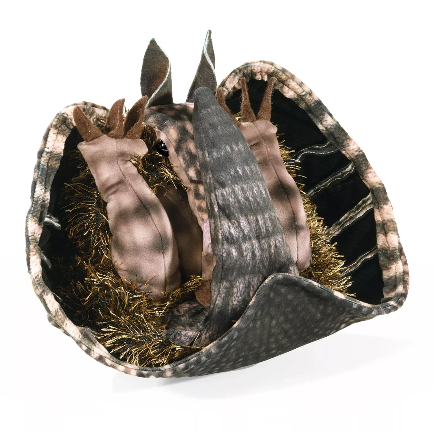 Folkmanis armadillo hand puppet in grey-brown scaly texture, curled up inside an opened shell with gold inner lining, top view