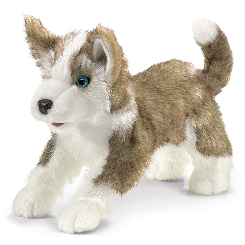 Folkmanis wolf pup hand puppet in brown and white with blue eyes, standing in side view