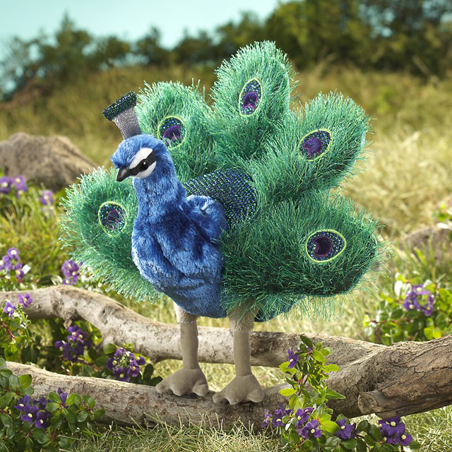 Folkmanis hand puppet small peacock with fanned green-blue tail and purple eye spots, standing on a branch