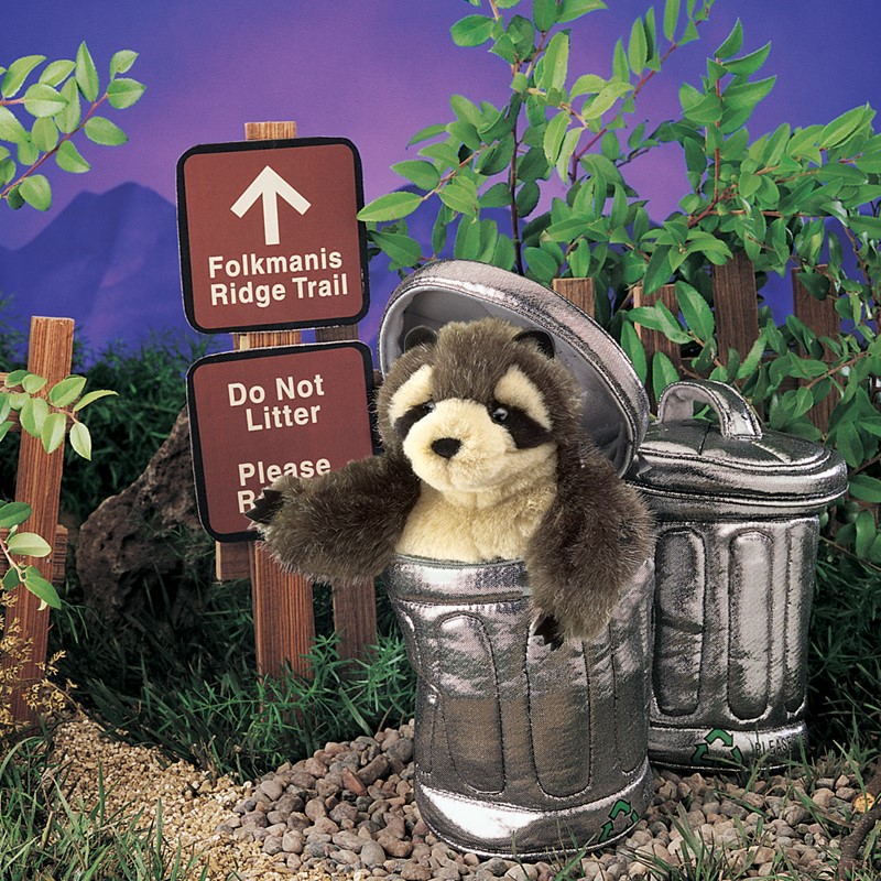 Folkmanis hand puppet raccoon peeking out of a silver plush trash can, brown-grey fur with characteristic face mask
