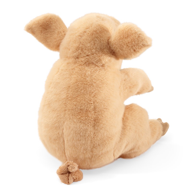 Folkmanis pig hand puppet in sand-coloured plush, rear view showing a characteristic curly tail and upright ears