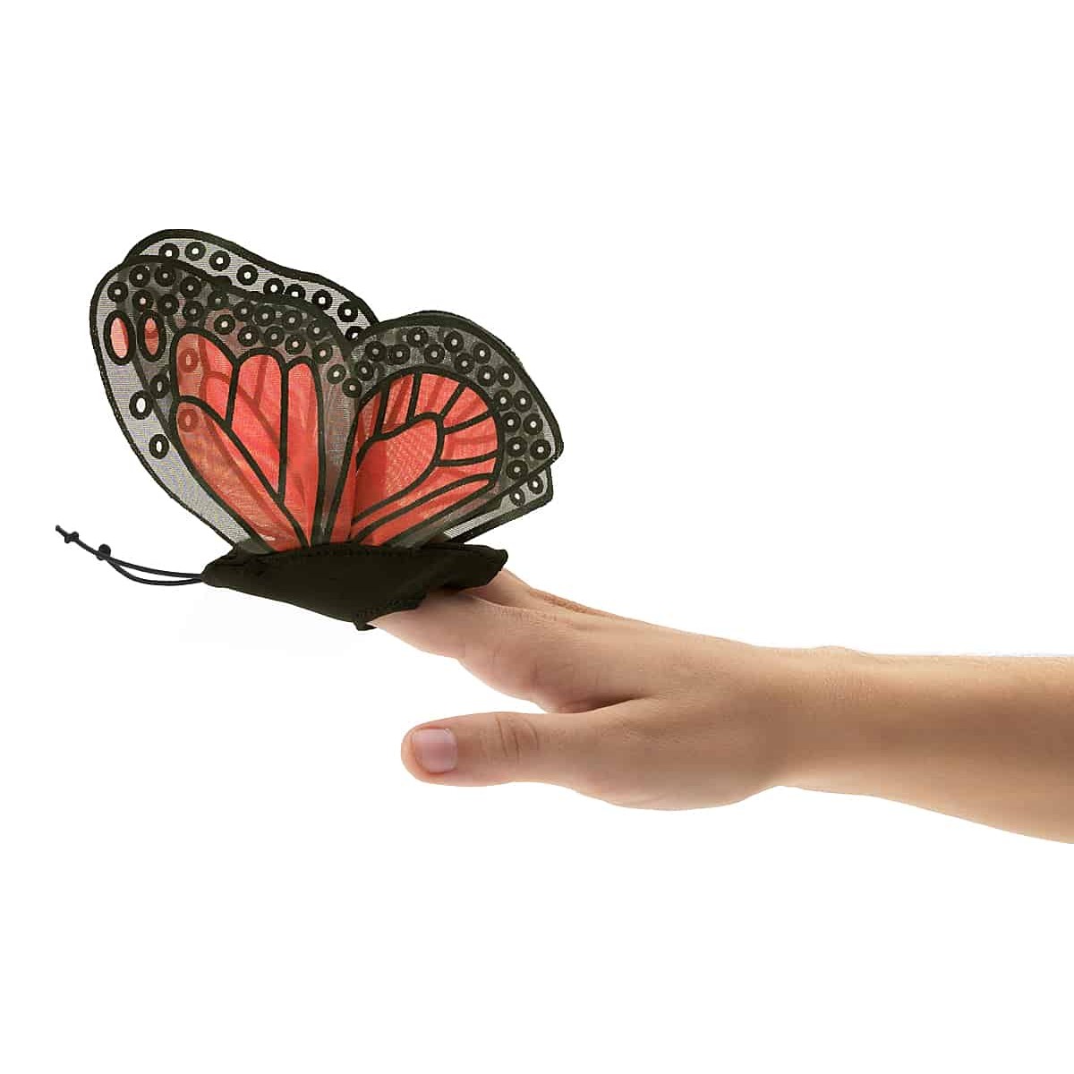 Folkmanis Fingerpuppe mini Monarchschmetterling mit rot-schwarzen Flügeln auf einem Zeigefinger, Seitenansicht