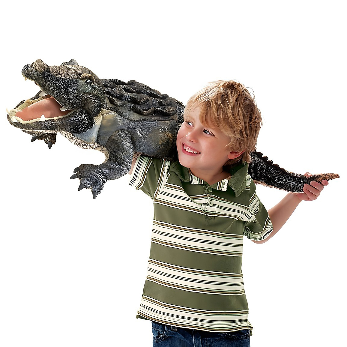 Boy holding a Folkmanis American Alligator hand puppet with open mouth over his shoulder, side view
