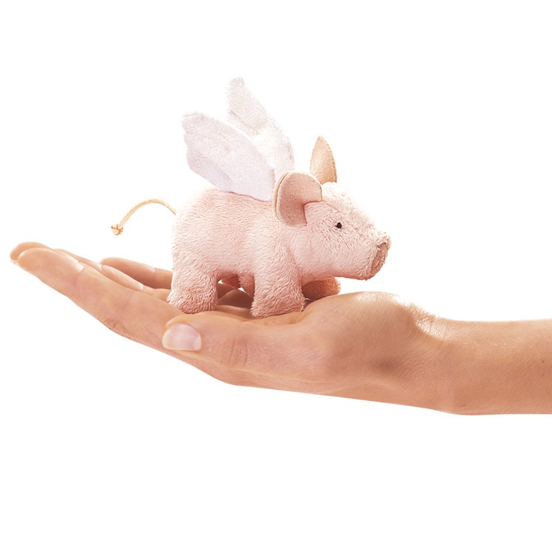 Folkmanis Mini-Fingerpuppe fliegendes Schwein mit weißen Flügeln, rosa Plüsch, auf einer Handfläche liegend