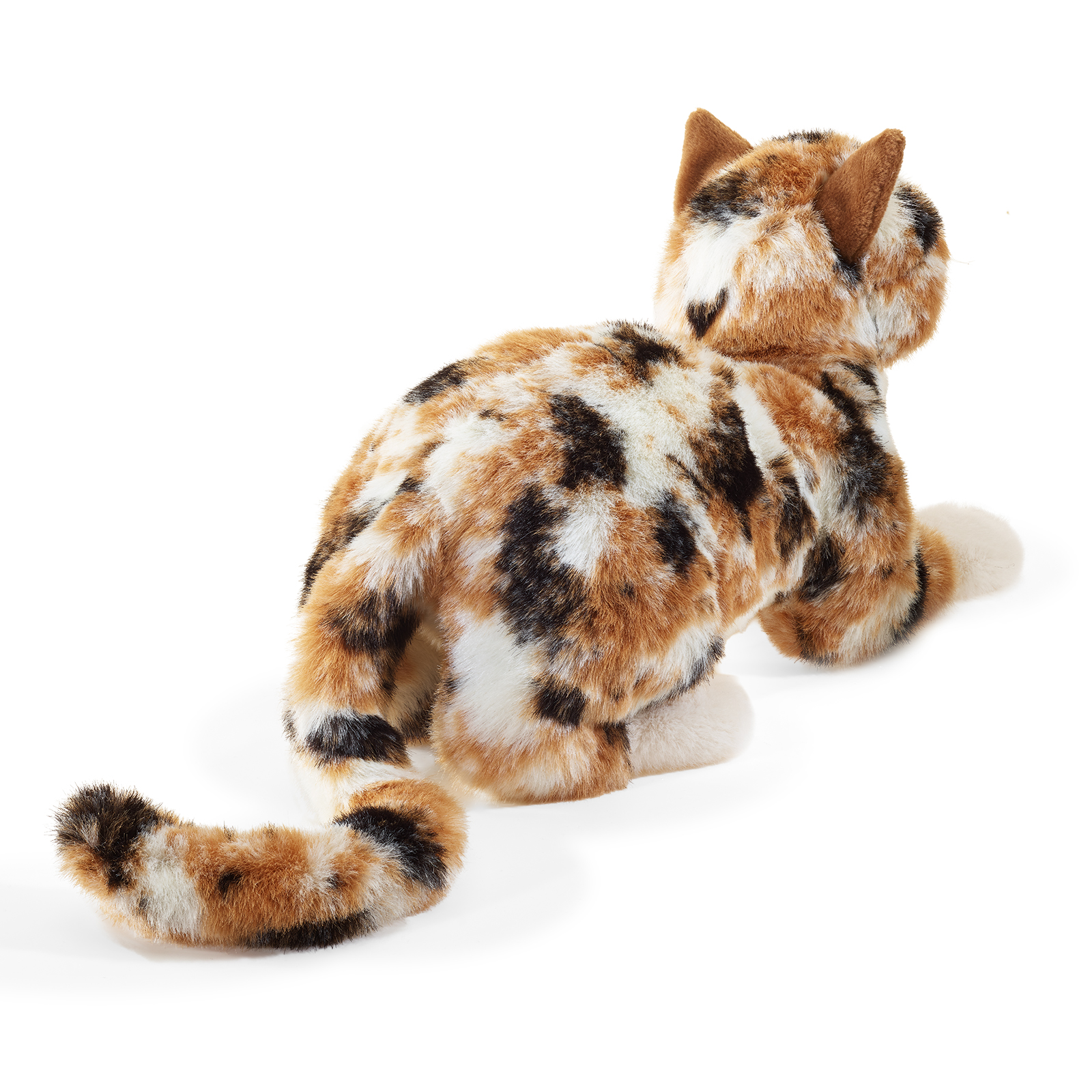 Folkmanis hand puppet calico lucky cat with tricolour fur in orange, black and white, photographed from behind in a seated position