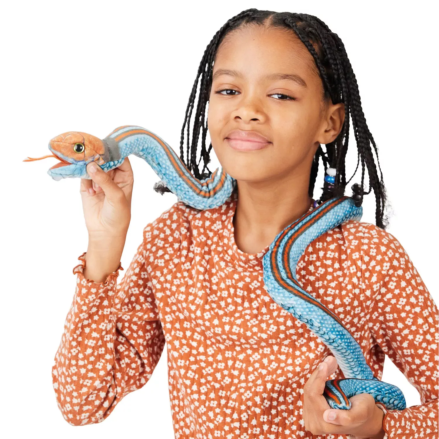 Girl holding a Folkmanis finger puppet San Francisco garter snake in blue and orange wrapped around her shoulder and arm, orange head with tongue out