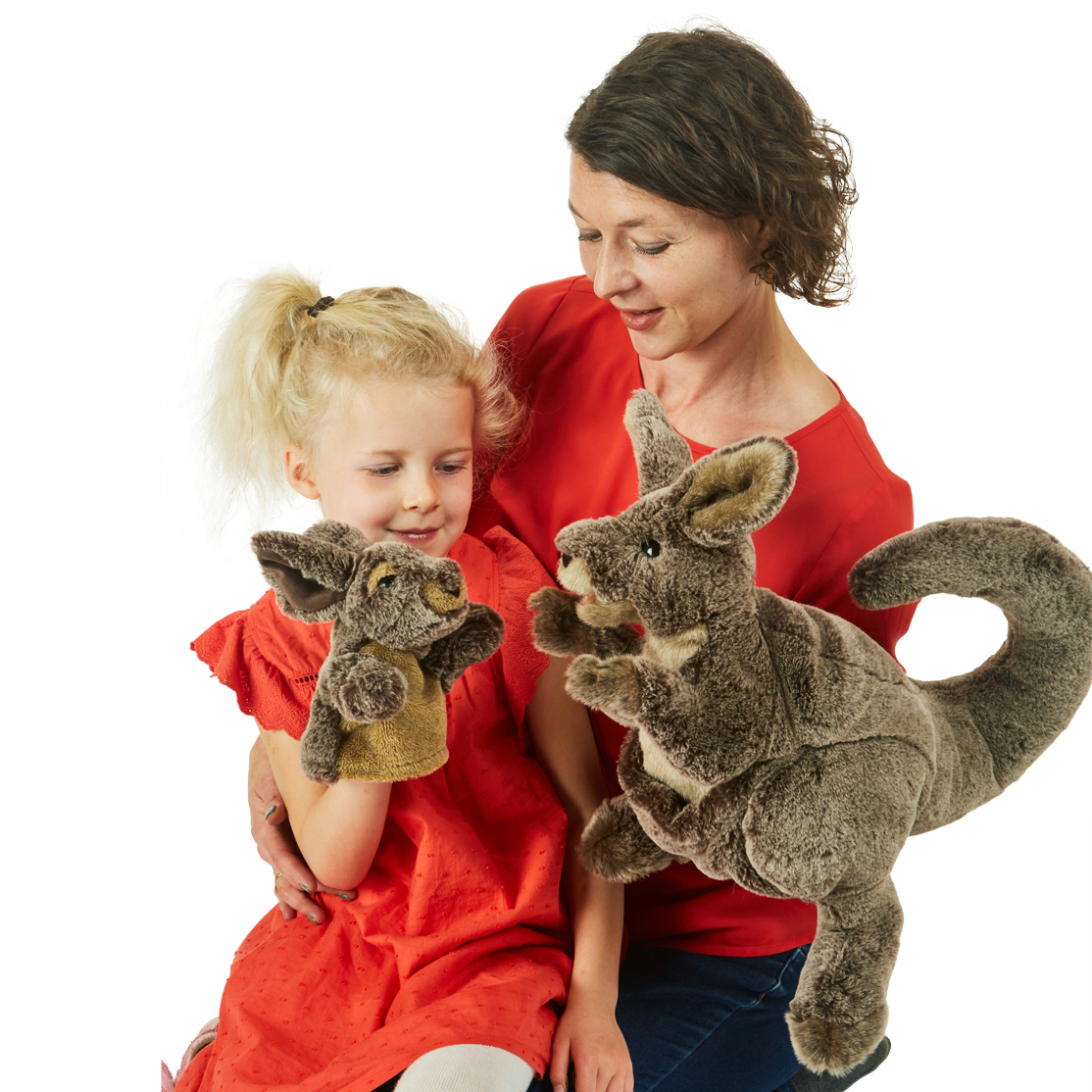 Woman and child playing with two Folkmanis grey-brown plush kangaroo with baby hand puppets on a white background