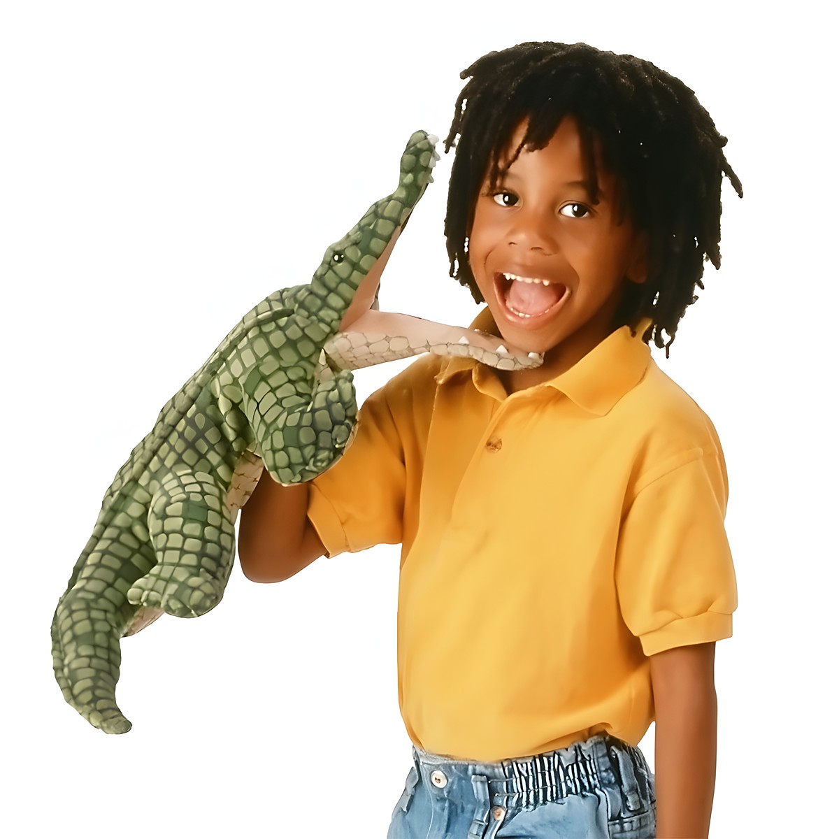 Child wearing a green Folkmanis alligator hand puppet with textured scale detailing over their arm, mouth open
