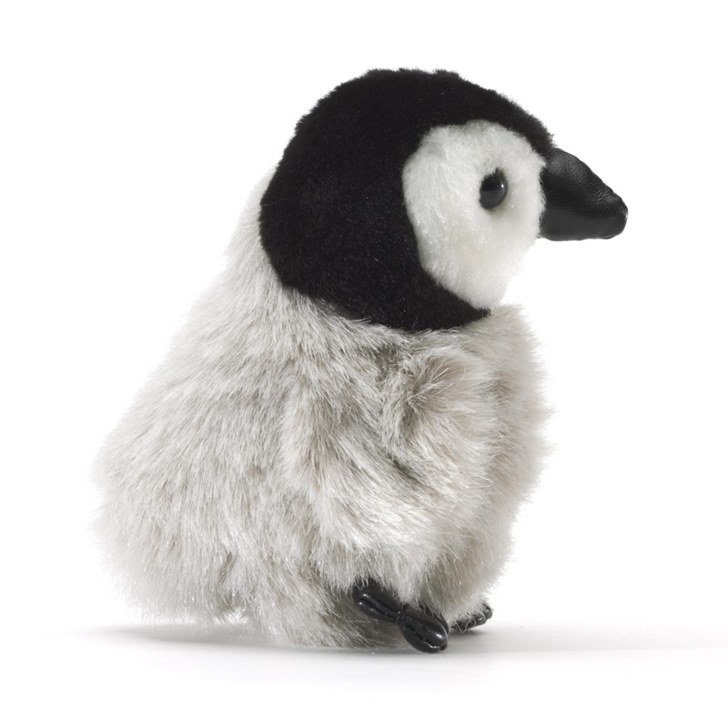 Folkmanis mini baby emperor penguin finger puppet in side view, fluffy grey plumage, black head with white face